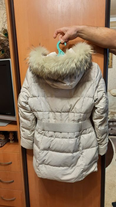 Продам жіночий пуховик 48р
