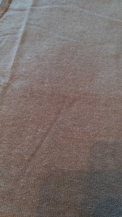 Colete de malha sem mangas com decote em V