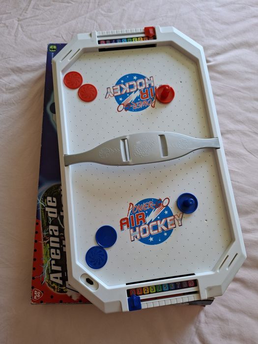 Jogo de air hockey