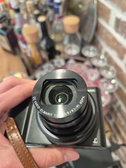 Panasonic Lumix TZ100 + bateria + ładowarka uniwersalna | przebieg 1000 zdjęć