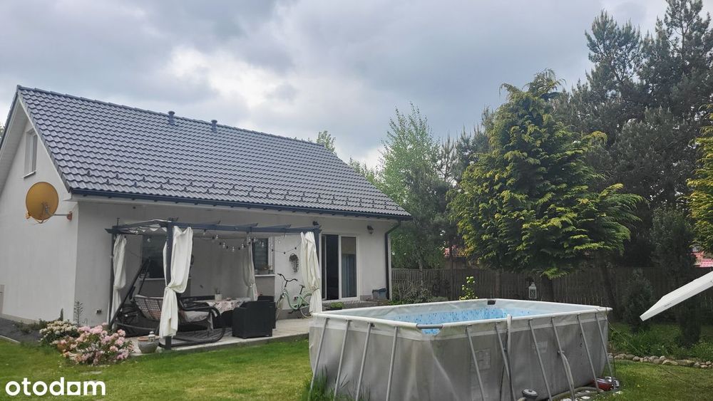Dom w otulinie lasów.