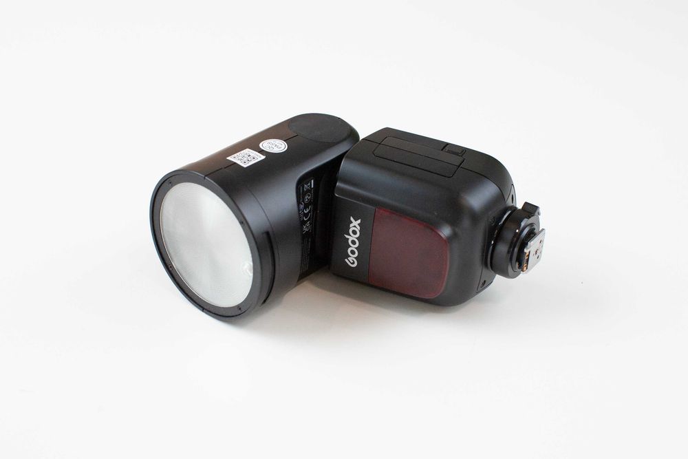 Flash Godox V1-S (para Sony) - Cabeça Redonda com Carregador e Acessórios