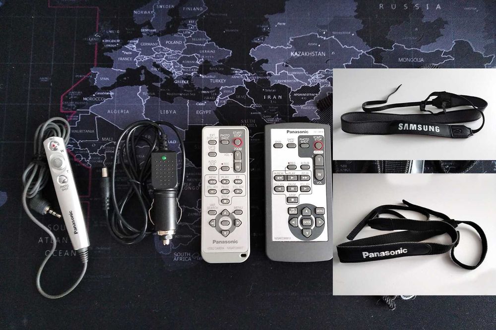 Дистанційонки, зарядний пристрій Panasonic, ремені для відеокамер