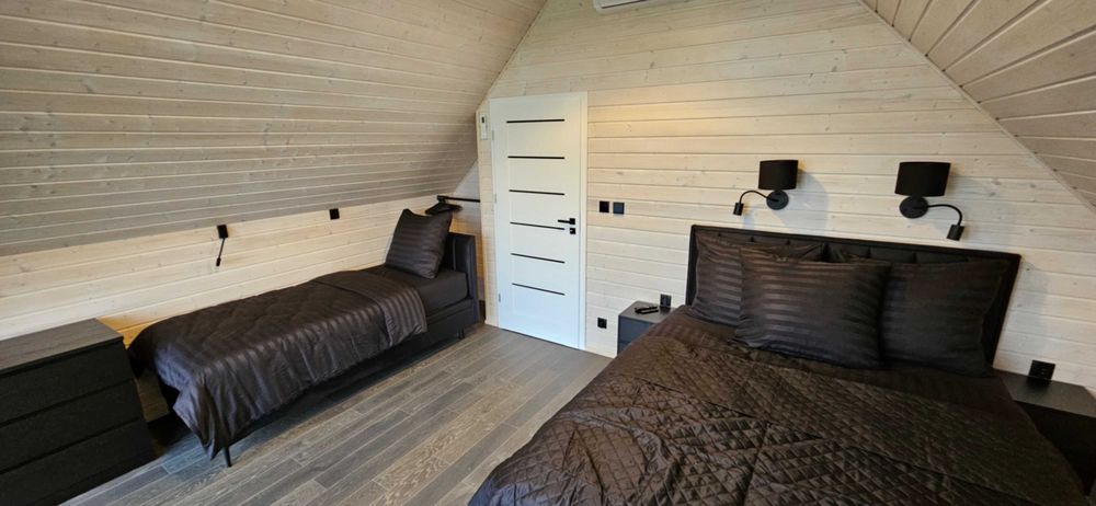 Domek jacuzzi cały rok sauna kominek wczasy Rusinowo Jarosławiec