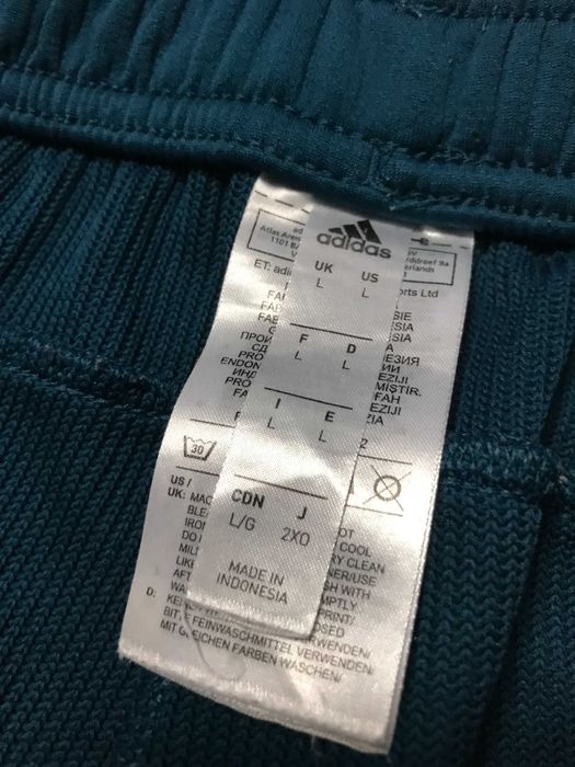 ADIDAS Climawarm r.L oryginalne spodnie sportowe męskie stan BDB