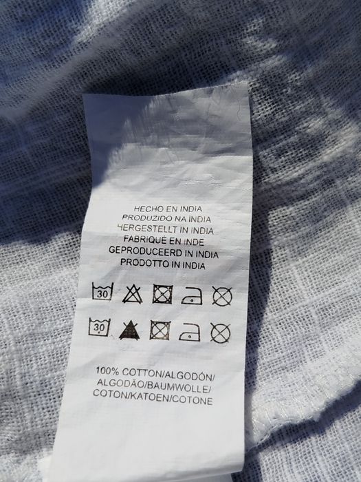 Biała spódnica na guziki z nieregularnym dołem Primark 40 L