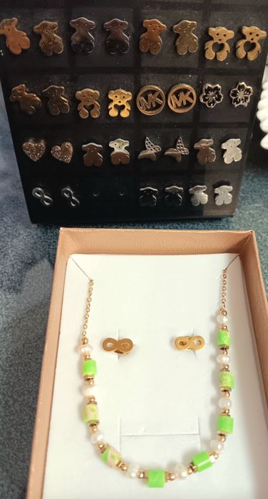 Brincos  pulseiras   aneis Mk  aço