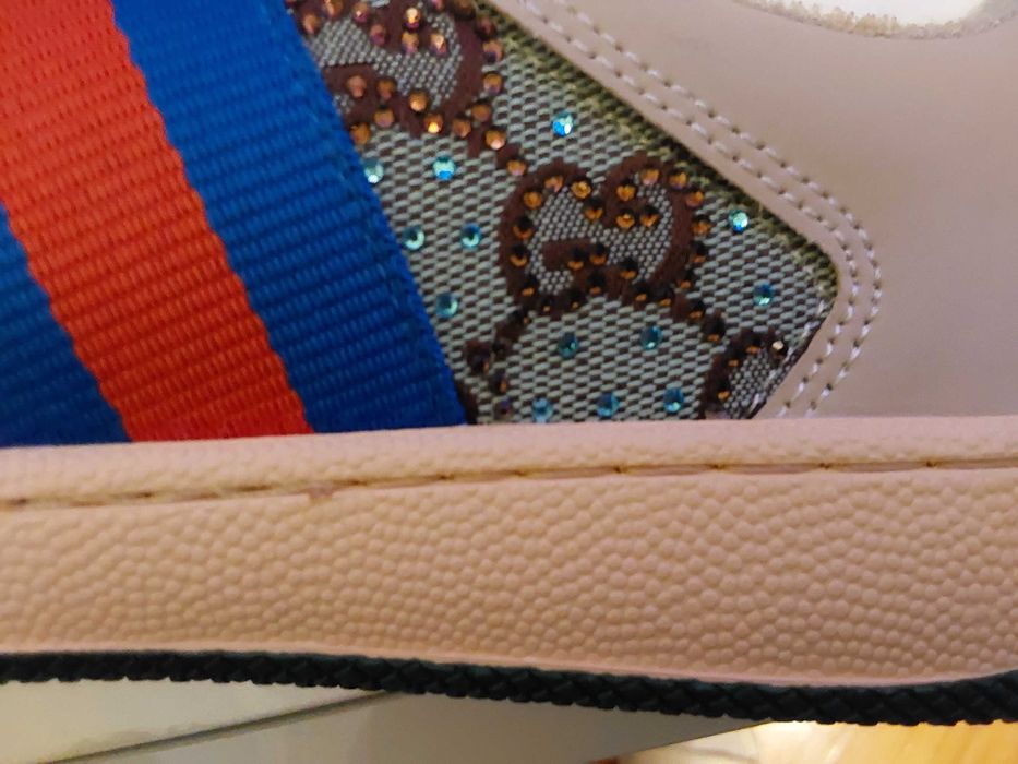 Sapatilhas Gucci.