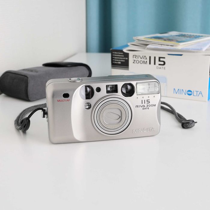 Minolta RIVA ZOOM DATE 115 - Плівковий фотоапарат
