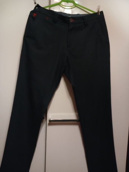 Продам новые мужские брюки size 44.