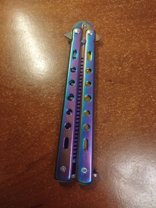 Ніж метелик (гребінець)