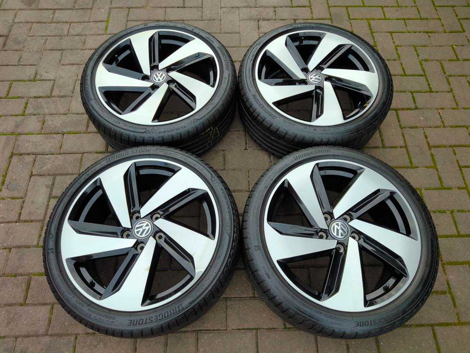 5x112 Koła Alu R18 VW Golf Caddy ET49 225/40 Bridgestone 2023r Letnie