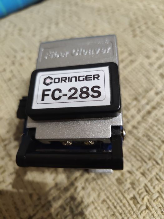 Скалыватель оптического волокна