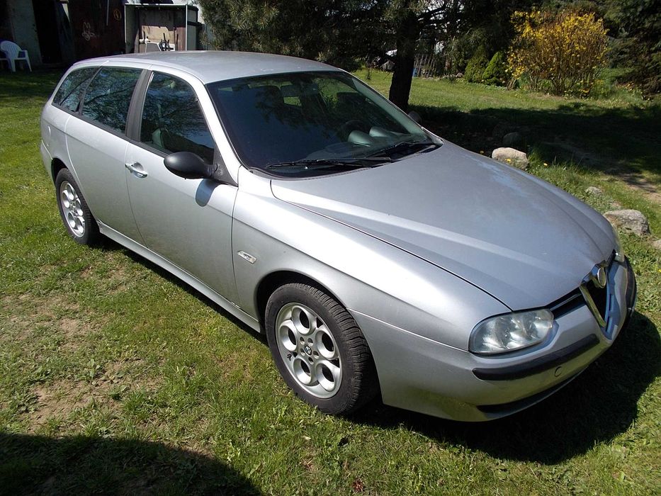 Alfa Romeo 156 1.9 JTD 110 KM Skóra Grigio chiaro 612 zderzak