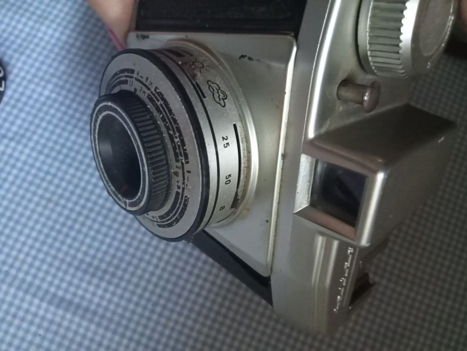 Máquina vintage com bolsa