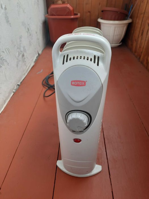 Електрообогреватель масляный. ROTEX на 6 секций.