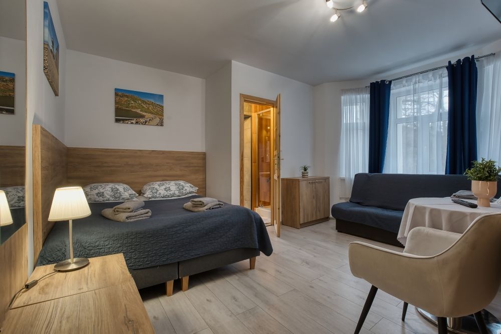 Tanie pokoje w centrum, balia, parking, ogólnodostępna kuchnia.