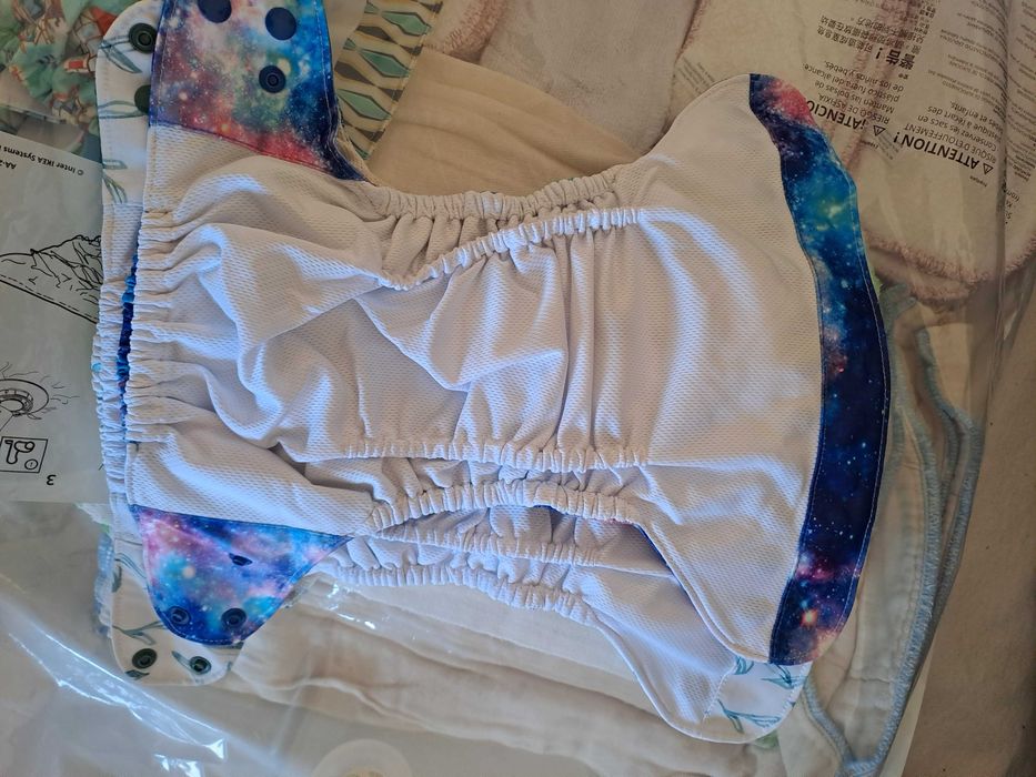 Fraldas reutilizáveis da Seedling Baby e da Bear Bott