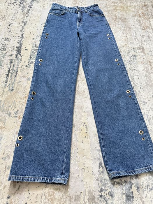Джинси Zara з люверсами