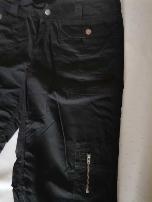 Czarne spodnie H&M Young rozmiar 164