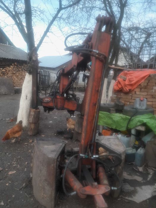 Грейферний погружчик