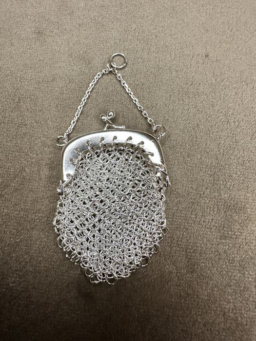 Medalha porta moedas em prata