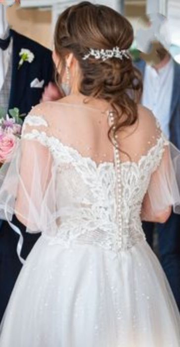 Suknia ślubna z odpinanymi rękawkami