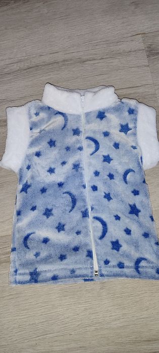 Безрукавочки теплі,нові