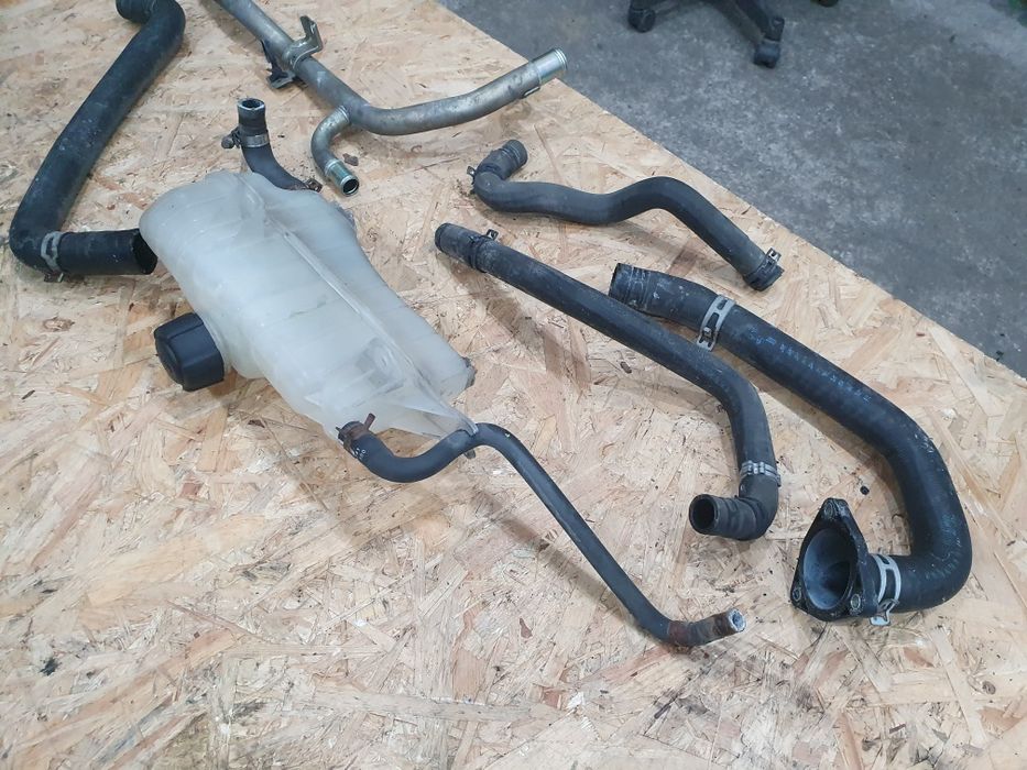 Magistrala króciec zbiorniczek wąż wodny Nissan Micra k12 1.2 04r