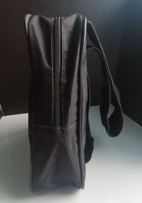 Mochila com publicidade à Coca-Cola