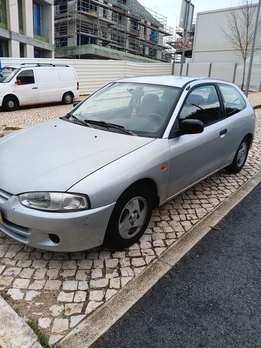 Mitsubishi Colt 1.3 GLX 1998 (com barra de reboque)