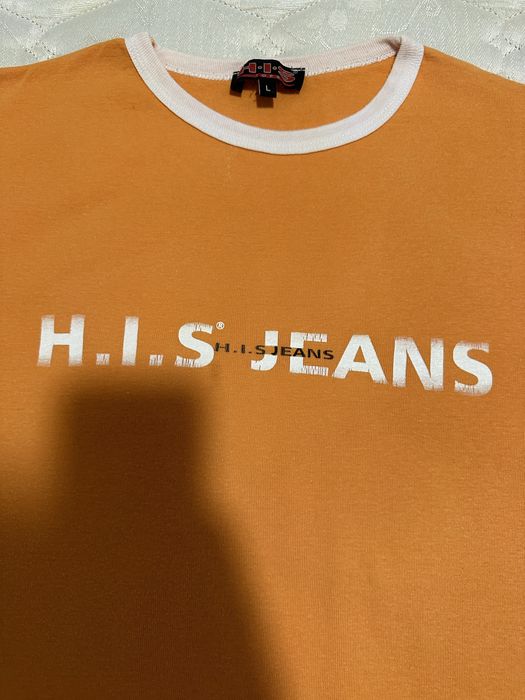 T-shirt laranja da marca polaca H.I.S Jeans.