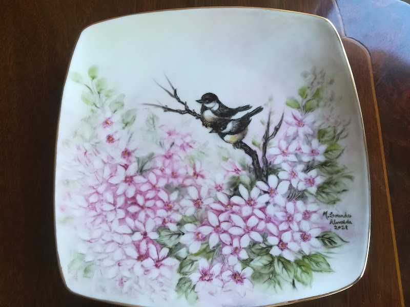 Hand-painted porcelain plates.428625429592156162