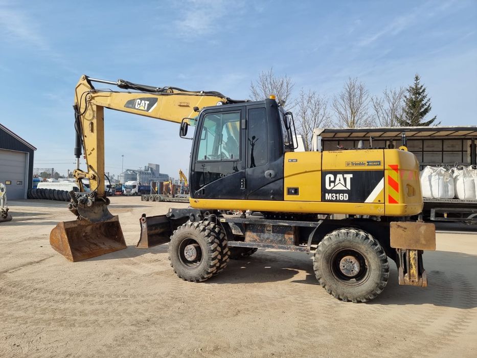 Продам колесный экскаватор Caterpillar М 316 D , 2012 г
