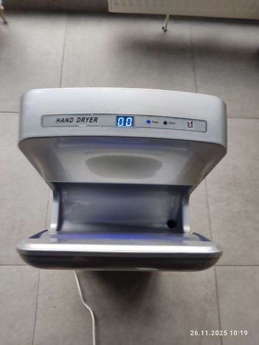 Сенсорна електро сушарка для рук.