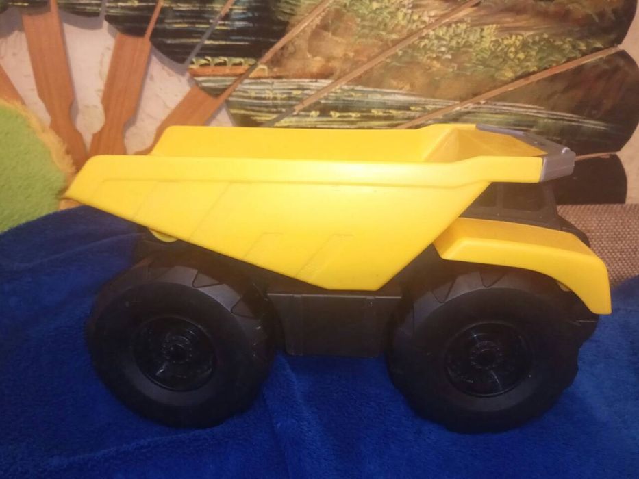 Машинка  Cat свет ,музыка и самосвал Jamara Германия  свет