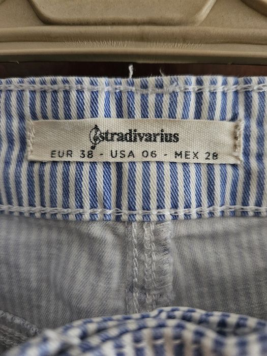 Calças às riscas azuis e brancas Stradivarius Tamanho 38