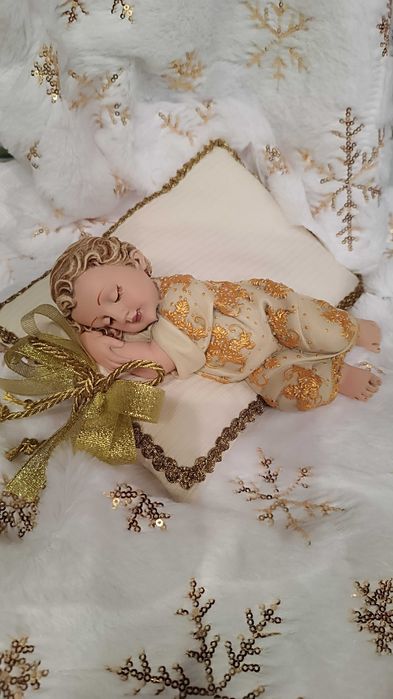 Menino jesus em marfinite pintado á mão