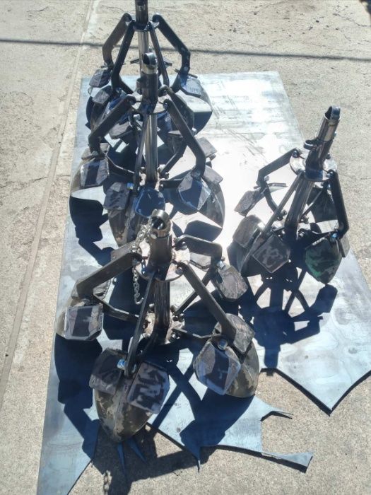 Приспособа для чистки криниць, водостічних труб і т.д.