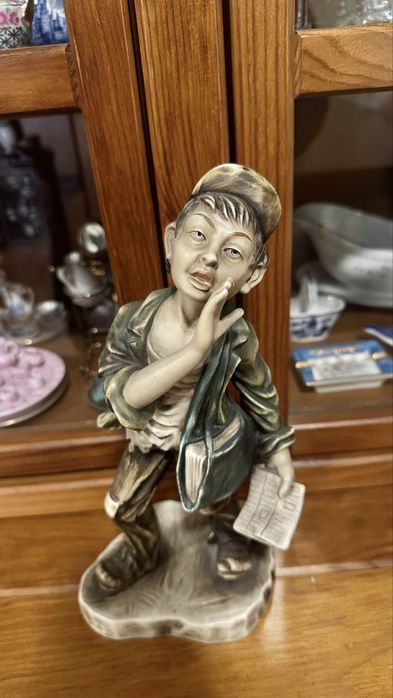 Estatueta porcelana Jornaleiro