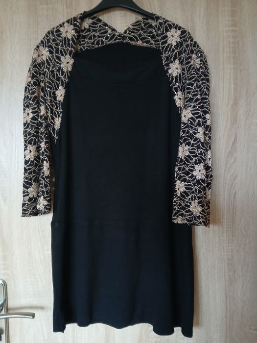 Czarna sukienka wizytowa  rozmiaru M/L .