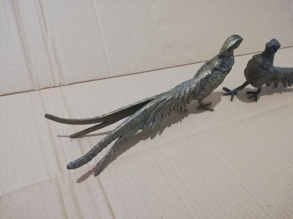 Casal faisões em metal