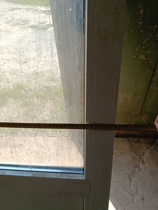 Продам металопластиковую дверь 225*65