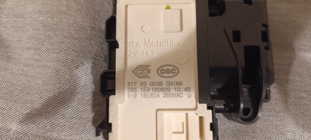 Mechanizm blokady drzwi do pralki Amica TAW 7123 LCW