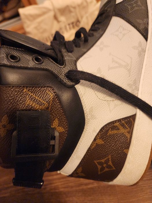 Tenis da louis viton  impecavel muito novo