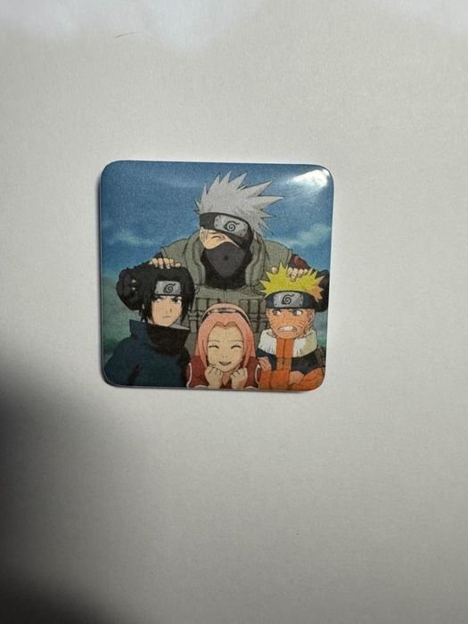 Ímans, crachás e porta chaves