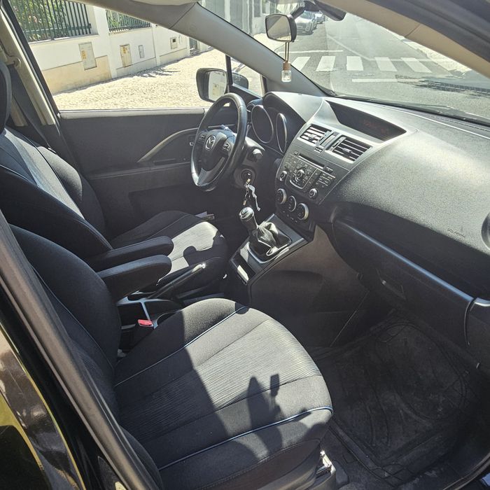 Vendo masda 5 de 2011 de 7 lugares com apenas 163 mil km esta rigorosamente impecável