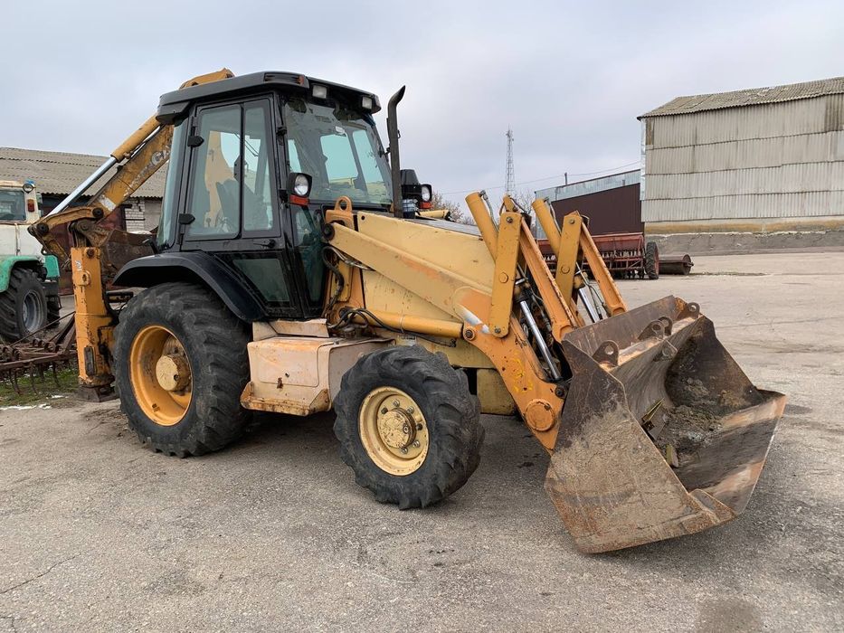 Case 580SM екскаватор навантажувач