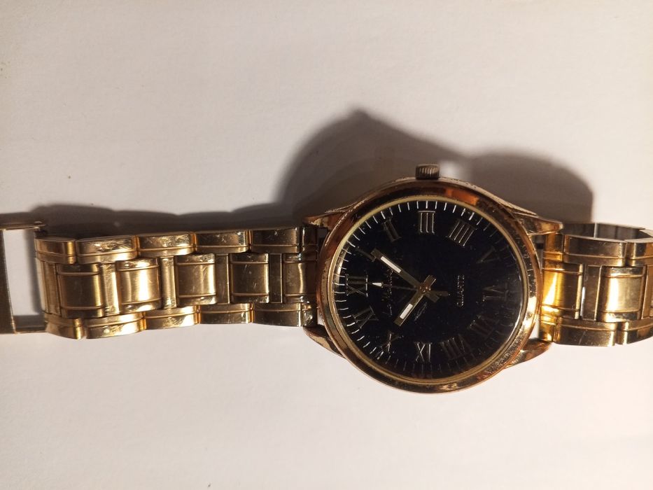 Zegarek damsko-męski -kolor złoty. Marka Lagamufone.