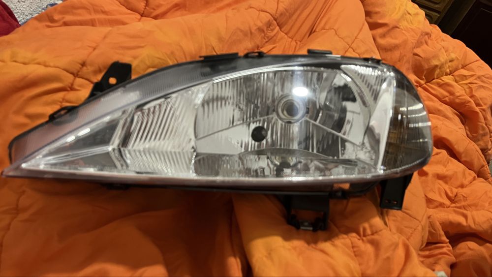 Farol reno megane 1999